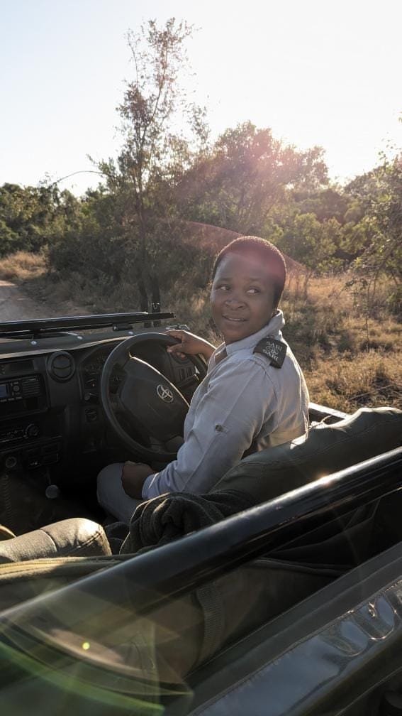 Queen Manyike guiding her guests from the drivers seat. Queen Manyike guiding her guests from the drivers seat.
