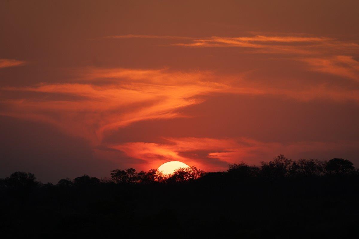 A red African sunset bids the day farewell.