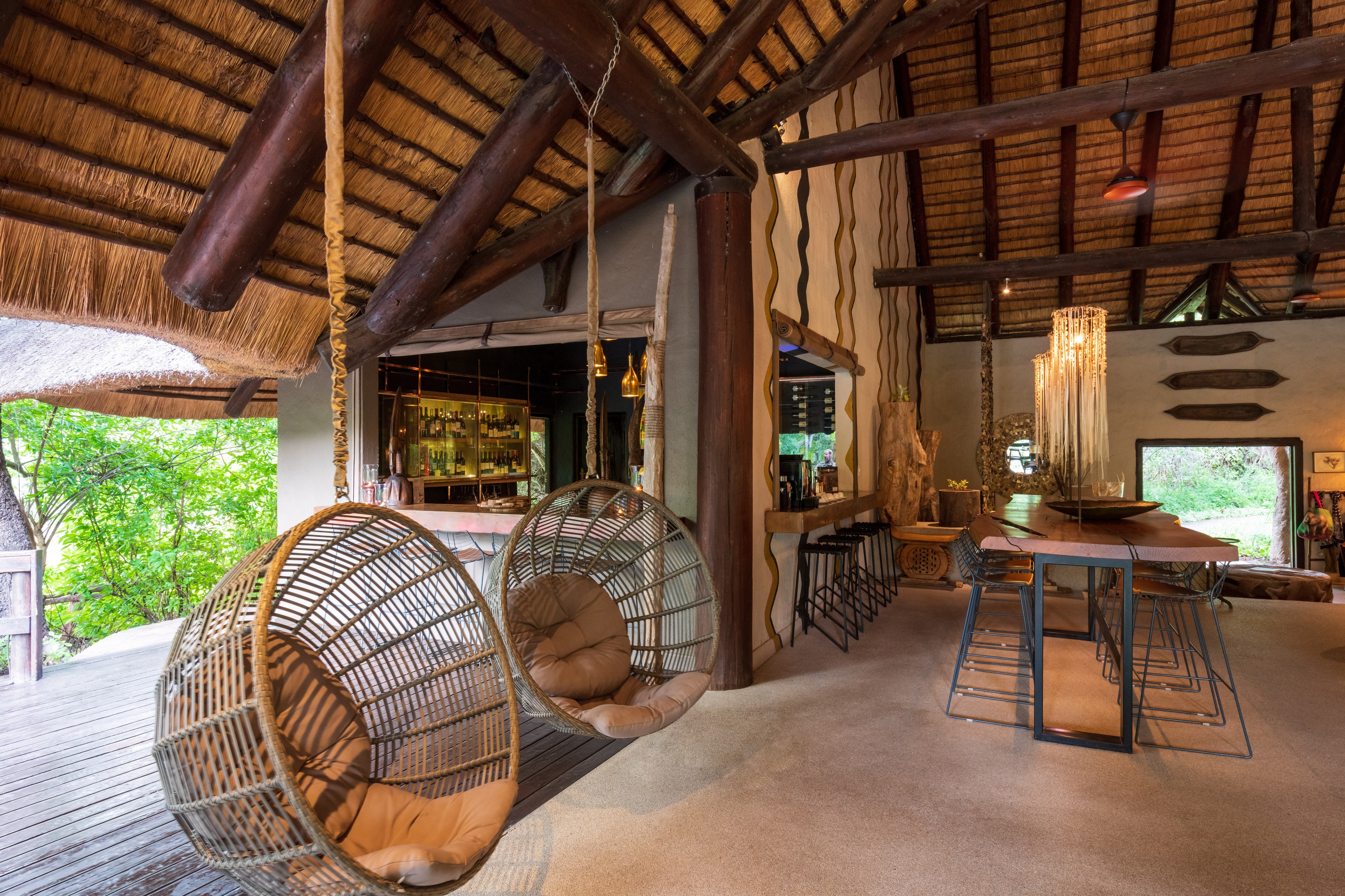 Relax in the sophisticated Little Bush Camp lounge or have a refreshment at the bar. Relax in the sophisticated Little Bush Camp lounge or have a refreshment at the bar.