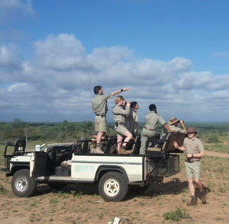 Guides stand on the game viewer to get a better vantage point. Guides stand on the game viewer to get a better vantage point.