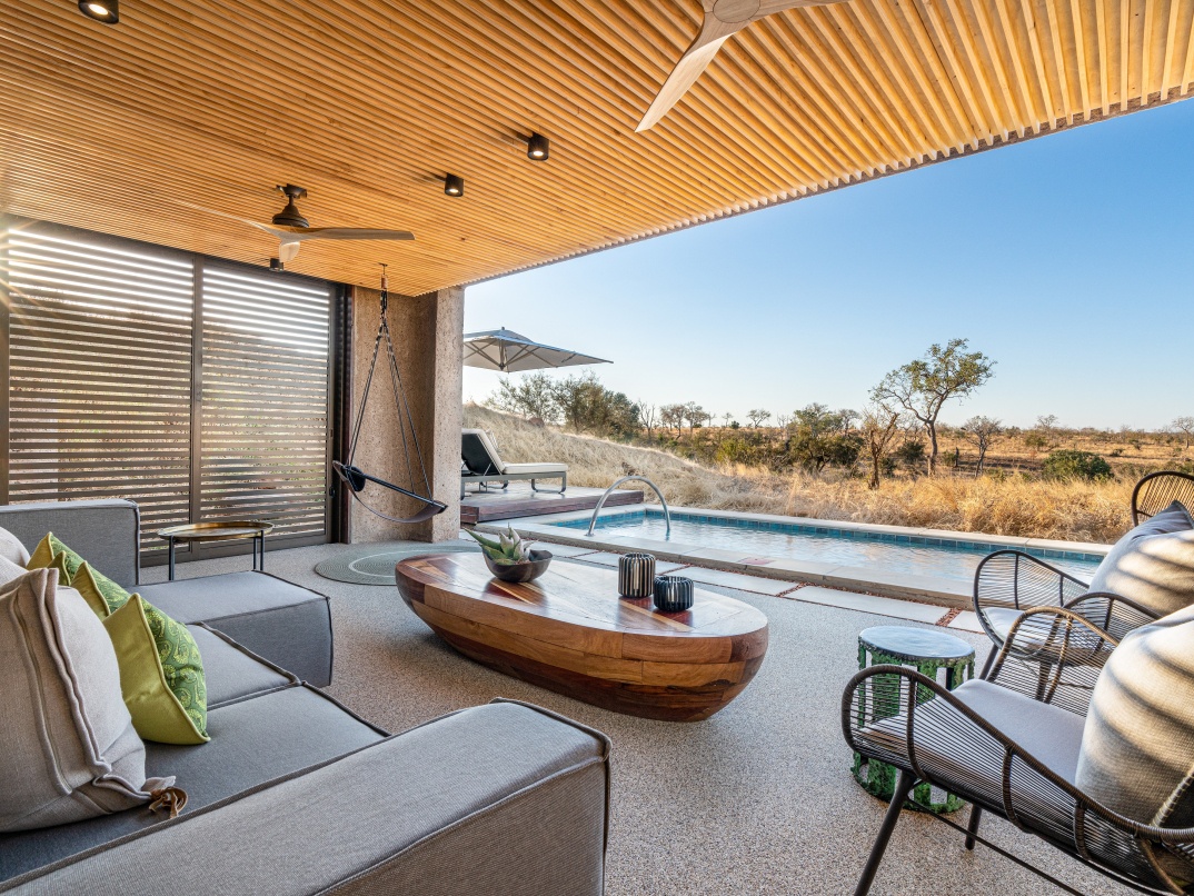 Immerse in breathtaking bush views from your Sabi Sabi Earth Lodge suite, where nature's beauty unfolds. Immerse in breathtaking bush views from your Sabi Sabi Earth Lodge suite, where nature's beauty unfolds.