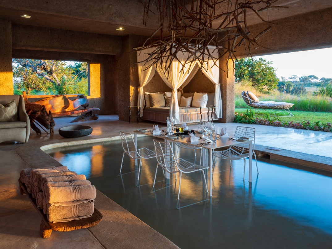 Be captivated by the masterpiece of organic design and architectural brilliance at Sabi Sabi Earth Lodge.