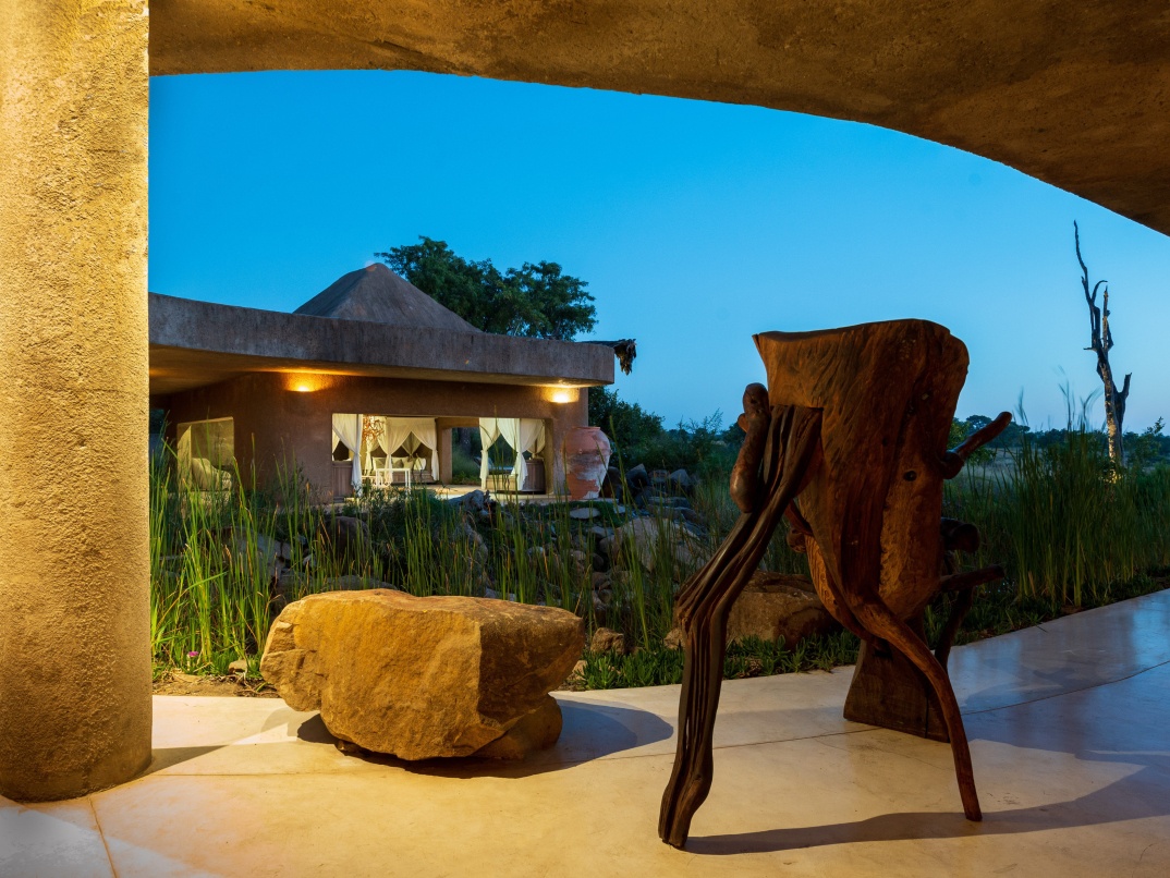 Sabi Sabi Earth Lodge offers a luxurious ambiance with captivating décor for an unforgettable experience.