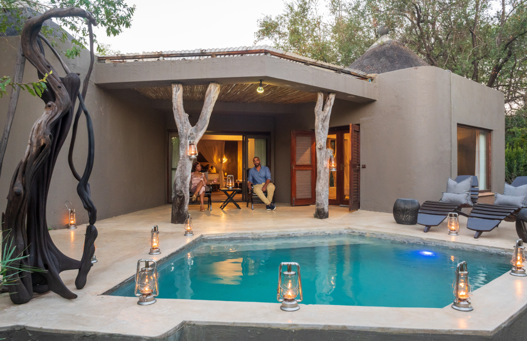 Sabi Sabi guests enjoying their luxurious Amber Presidential Suite at Earth Lodge. Sabi Sabi guests enjoying their luxurious Amber Presidential Suite at Earth Lodge.