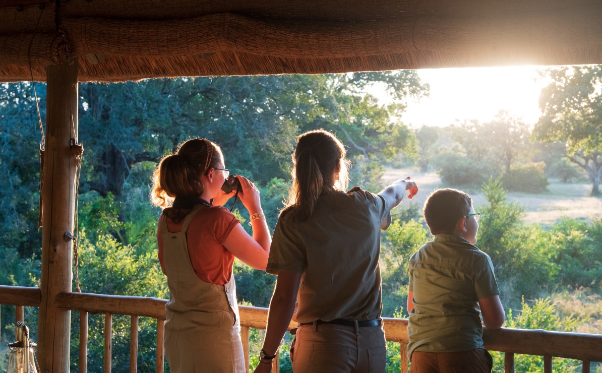 Kids exploring the beautiful Sabi Sabi reserve with a professional guide. Kids exploring the beautiful Sabi Sabi reserve with a professional guide.