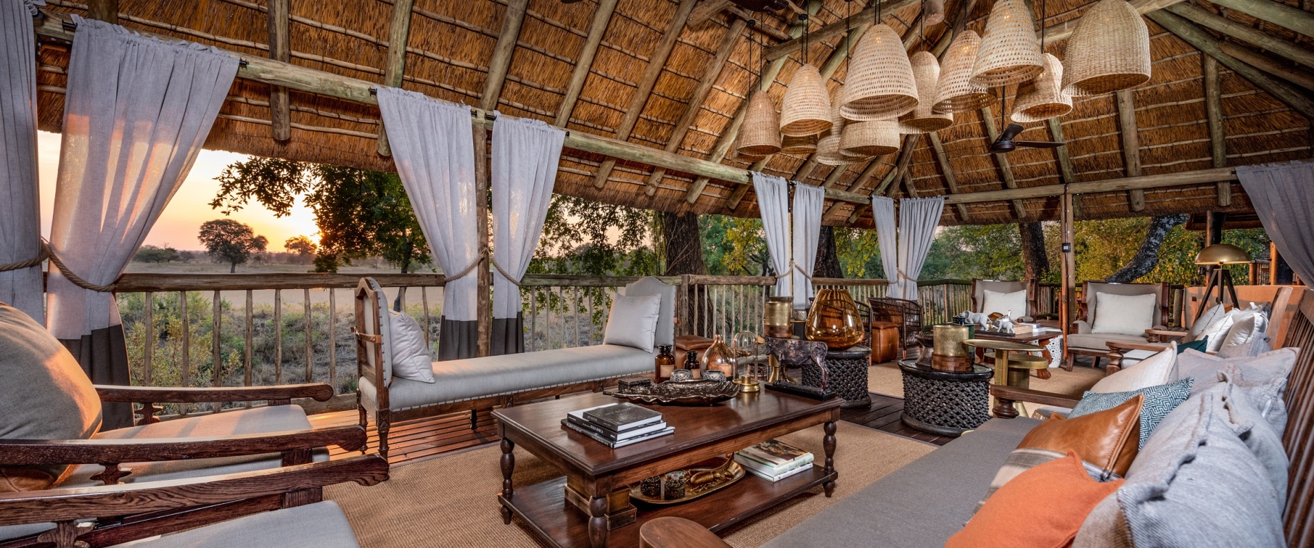Unwind in Selati Camp's African history-steeped bar lounge over drinks.
