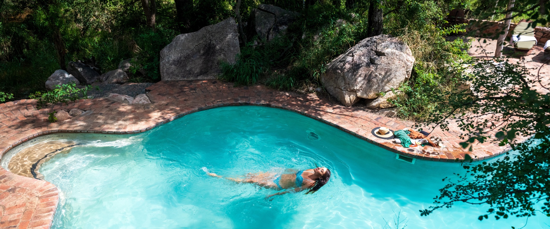 Relax in a private pool surrounded by nature at Sabi Sabi, a tranquil escape.