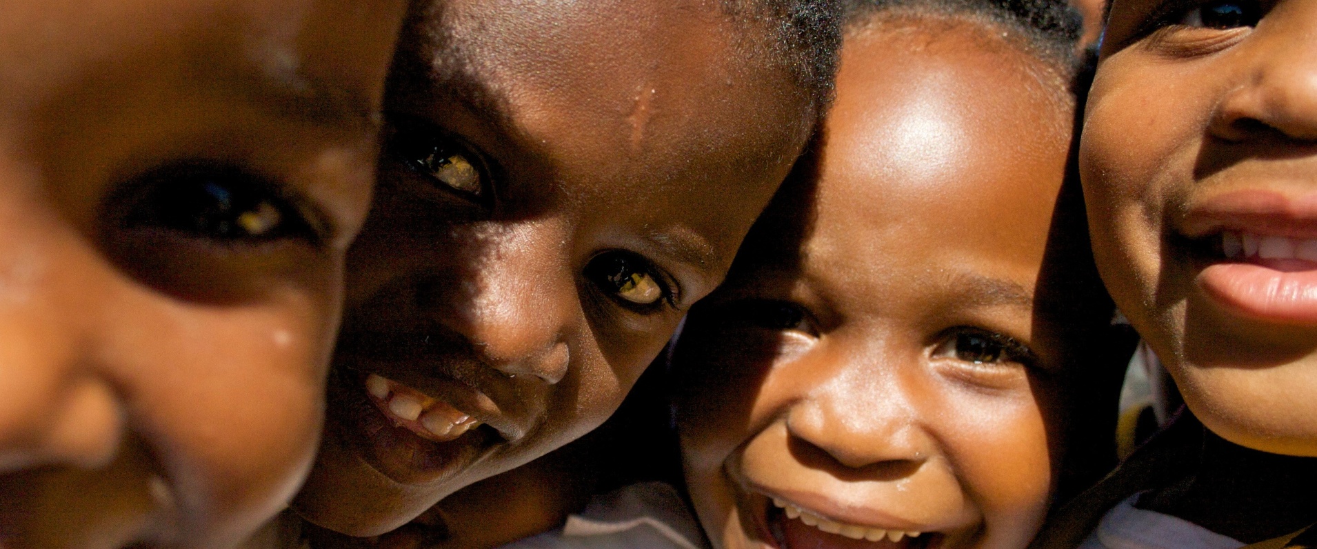 Smiling children from the local community. Smiling children from the local community.