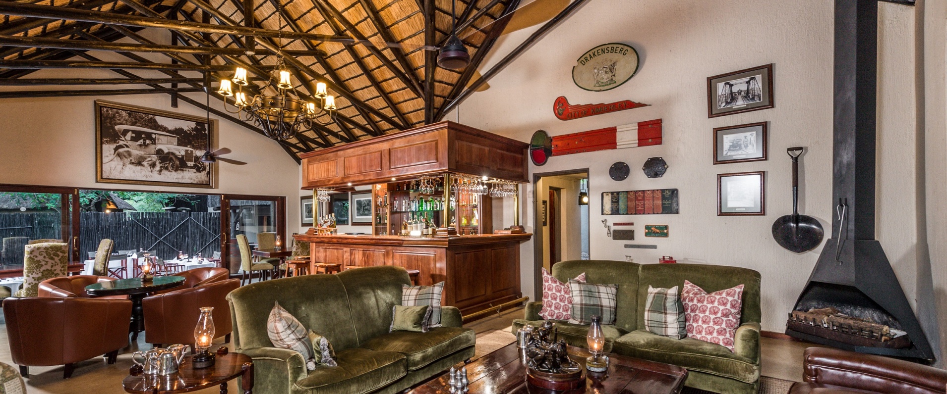 Indulge in the opulence of Selati Camp's lounge and bar, where luxury seamlessly blends with relaxation.