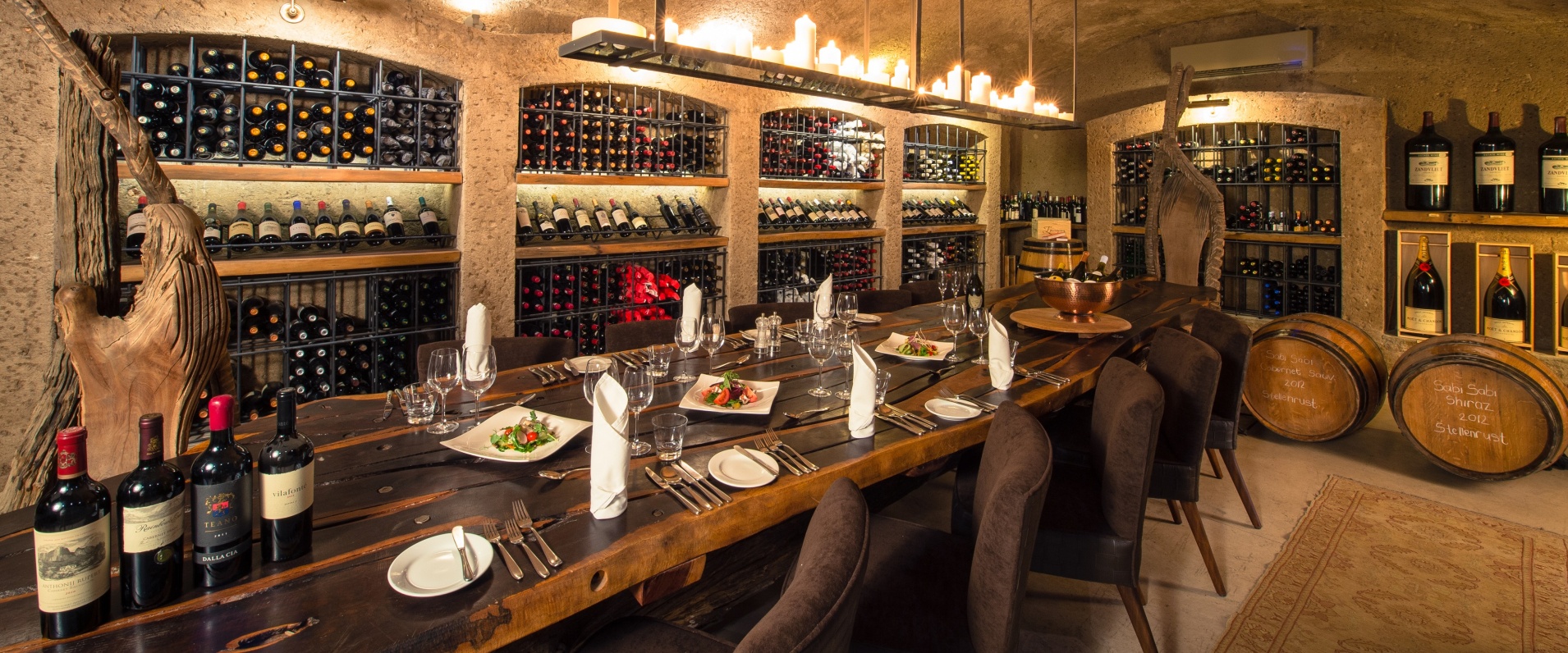 Elevate dining at Earth Lodge's wine cellar, where exquisite meals and fine vintages await. Elevate dining at Earth Lodge's wine cellar, where exquisite meals and fine vintages await.