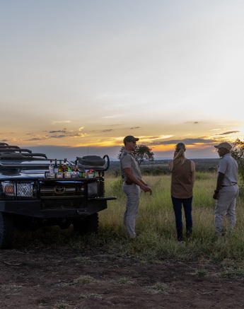The Sabi Sabi safari vehicle pulled aside for a sun downer
