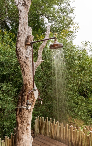 Feel the gentle breeze during an outdoor shower at Mahlatini and Tumbela Luxury Villas, a revitalizing experience. Feel the gentle breeze during an outdoor shower at Mahlatini and Tumbela Luxury Villas, a revitalizing experience.