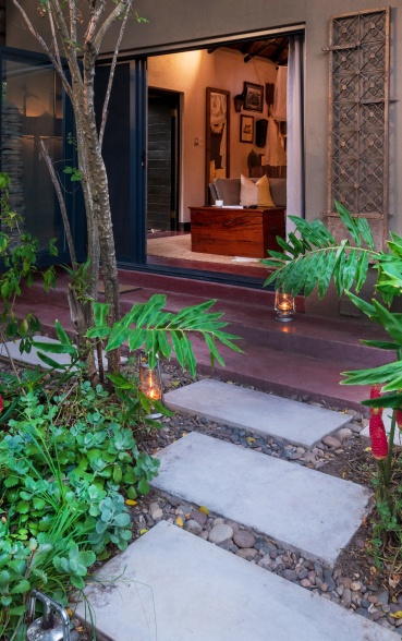 Experience nature in a private garden at Selati Camp Luxury Suite.