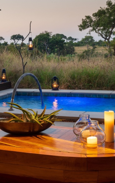 Luxuriate in a tranquil private pool at Earth Lodge, surrounded by nature's splendour.