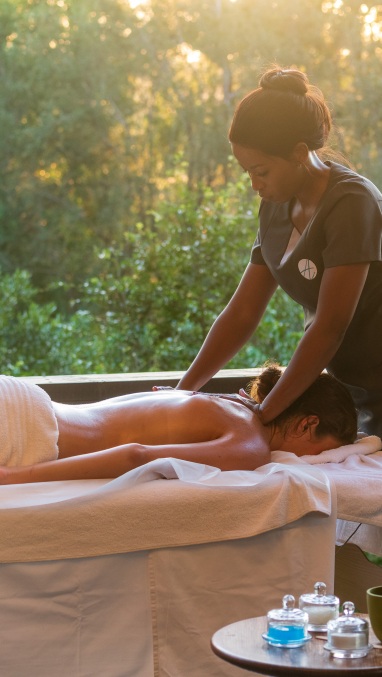 A Sabi Sabi guest indulged in a luxurious back massage that left them feeling rejuvenated. A Sabi Sabi guest indulged in a luxurious back massage that left them feeling rejuvenated.
