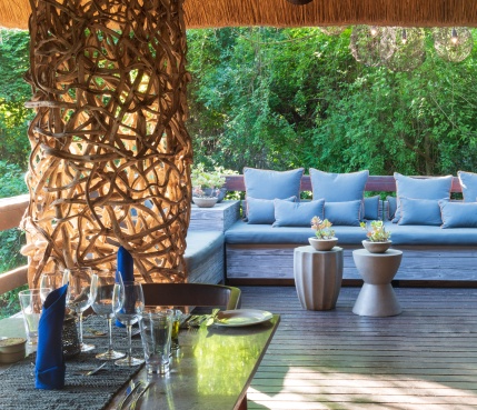 Little Bush Camp outdoor lounge on a deck overlooking the Sabi Sabi bush. Little Bush Camp outdoor lounge on a deck overlooking the Sabi Sabi bush.