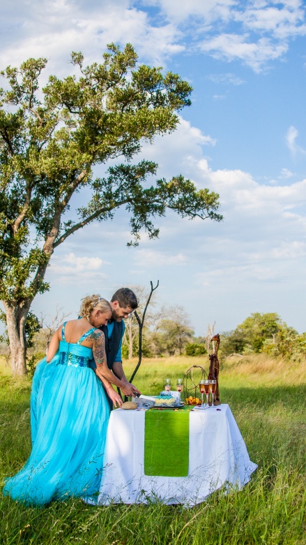 Newly wed couple celebrating love in Sabi Sabi Private Game Reserve. Newly wed couple celebrating love in Sabi Sabi Private Game Reserve.