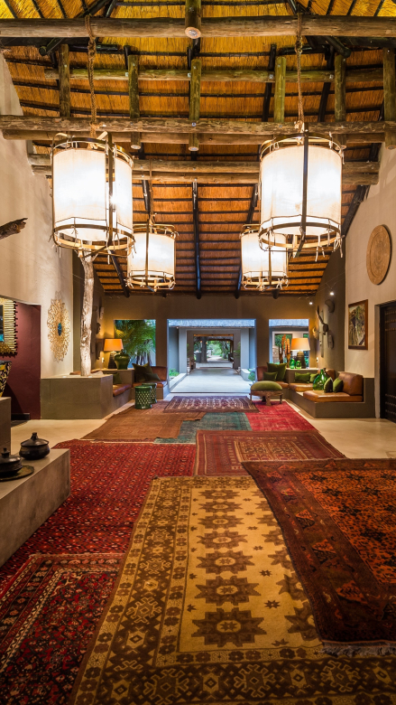 Enter the graceful foyer of Bush Lodge and revel in its captivating interior design. Enter the graceful foyer of Bush Lodge and revel in its captivating interior design.