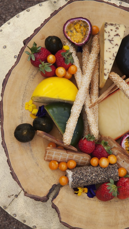Little Bush Camp's esteemed guests savor artful cheese fruit platters for delight.