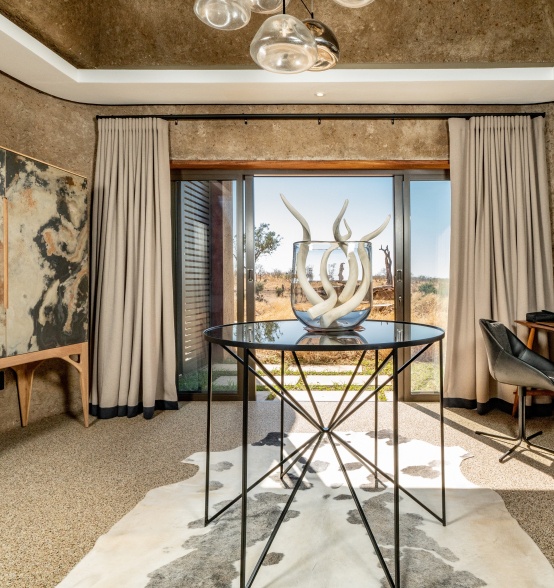 Enter Earth Lodge's designer luxury suites, an oasis of elegance for all your senses.