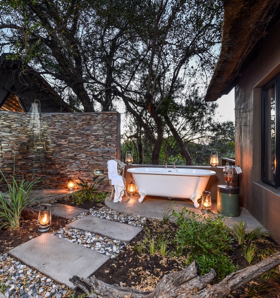 Be at one with nature in a luxurious outdoor bath at Selati Camp.