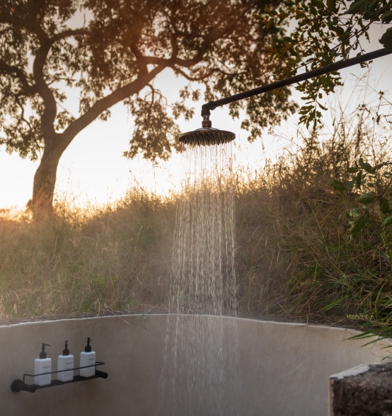 Surrender to sensory bliss with an outdoor shower at Earth Lodge.