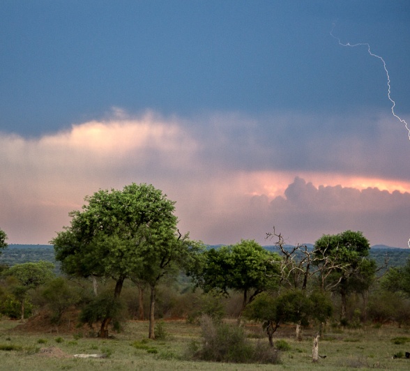 A captured landscape with a bolt of lightening appearing to come from the sky