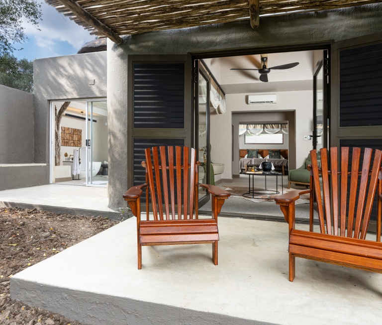 Raise a glass to the beauty of Africa while lounging on your private patio at Sabi Sabi Bush Lodge. Raise a glass to the beauty of Africa while lounging on your private patio at Sabi Sabi Bush Lodge.