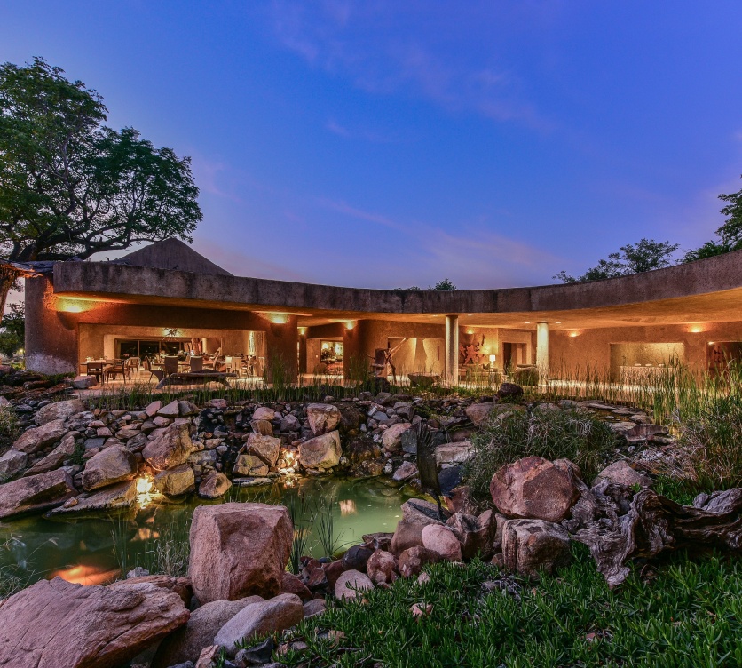 Marvel at the breathtaking beauty of Earth Lodge at Sabi Sabi, an opulent architectural testament.