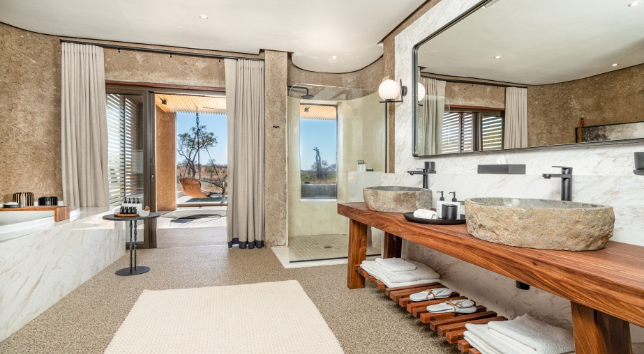 The spacious shower at Earth Lodge's Luxury Suite allows for wildlife viewing whilst showering.