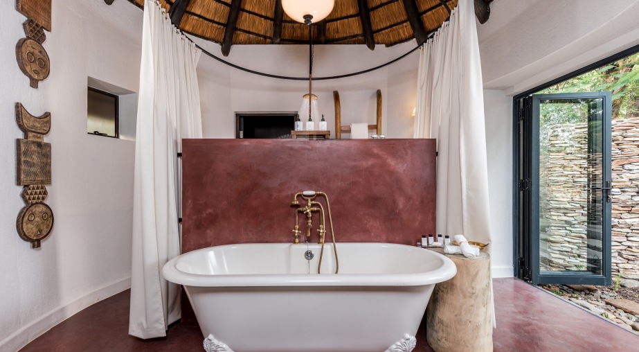 Luxurious freestanding ball-and-claw bathtub at Seltai Camp luxury suite.