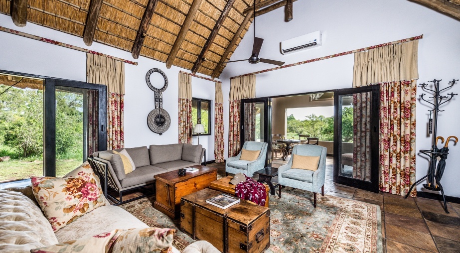 The Ivory Presidential Suite Sabi Sabi is furnished with historic antiques.
