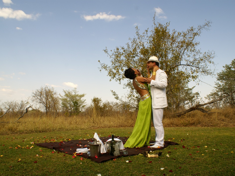 Bride and groom at Sabi Sabi enjoying their luxurious safari wedding. Bride and groom at Sabi Sabi enjoying their luxurious safari wedding.