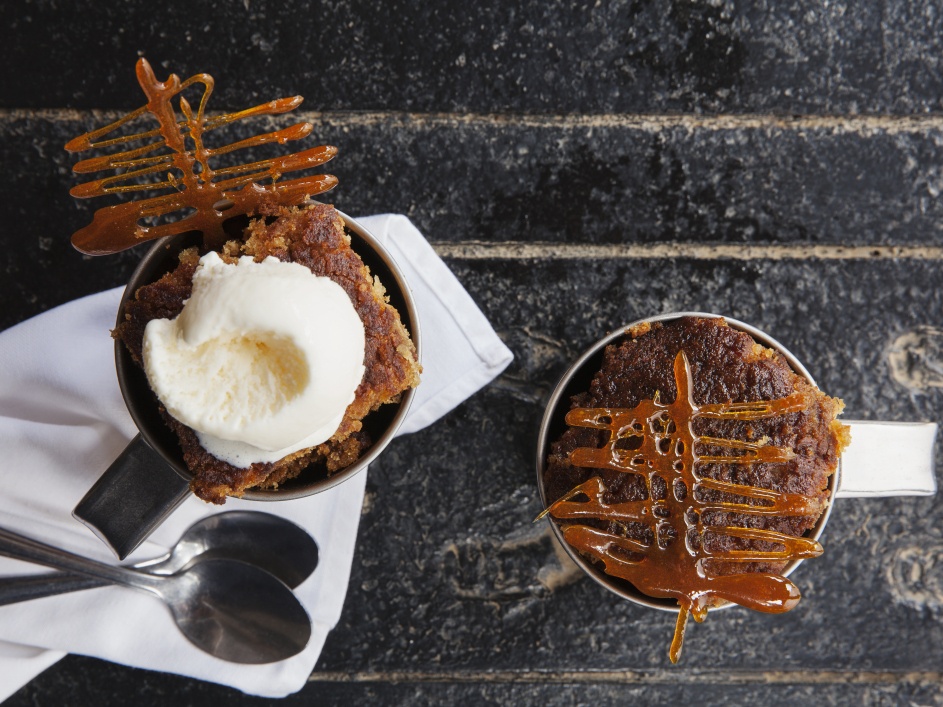 Savor the perfection of malva pudding, a delectable dessert at Sabi Sabi Little Bush Camp.