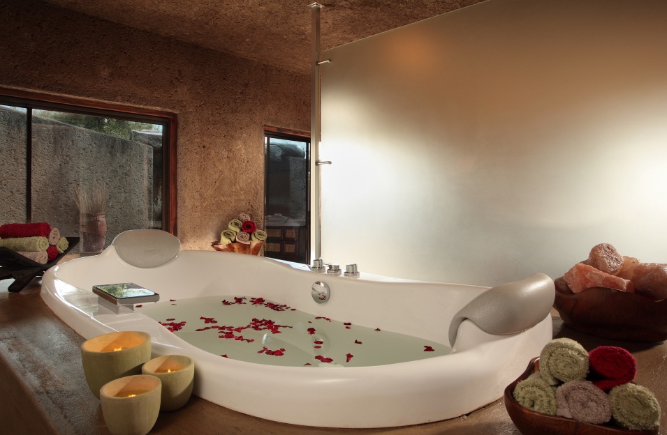 Indulge in the exquisite bath experience at Sabi Sabi Earth Lodge, a sensory sanctuary. Indulge in the exquisite bath experience at Sabi Sabi Earth Lodge, a sensory sanctuary.